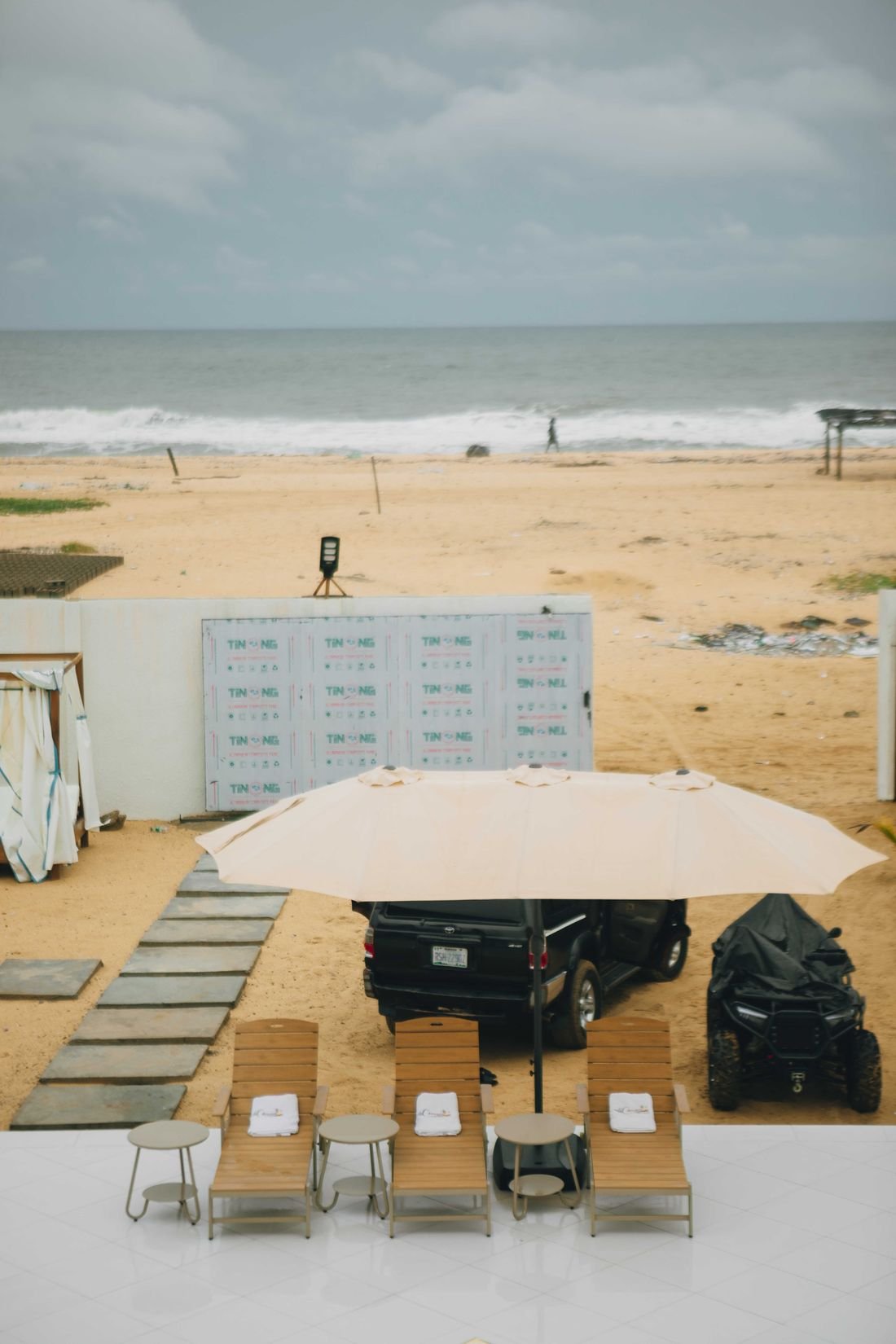 Loungers and a cabana on the empty Atlantic beach