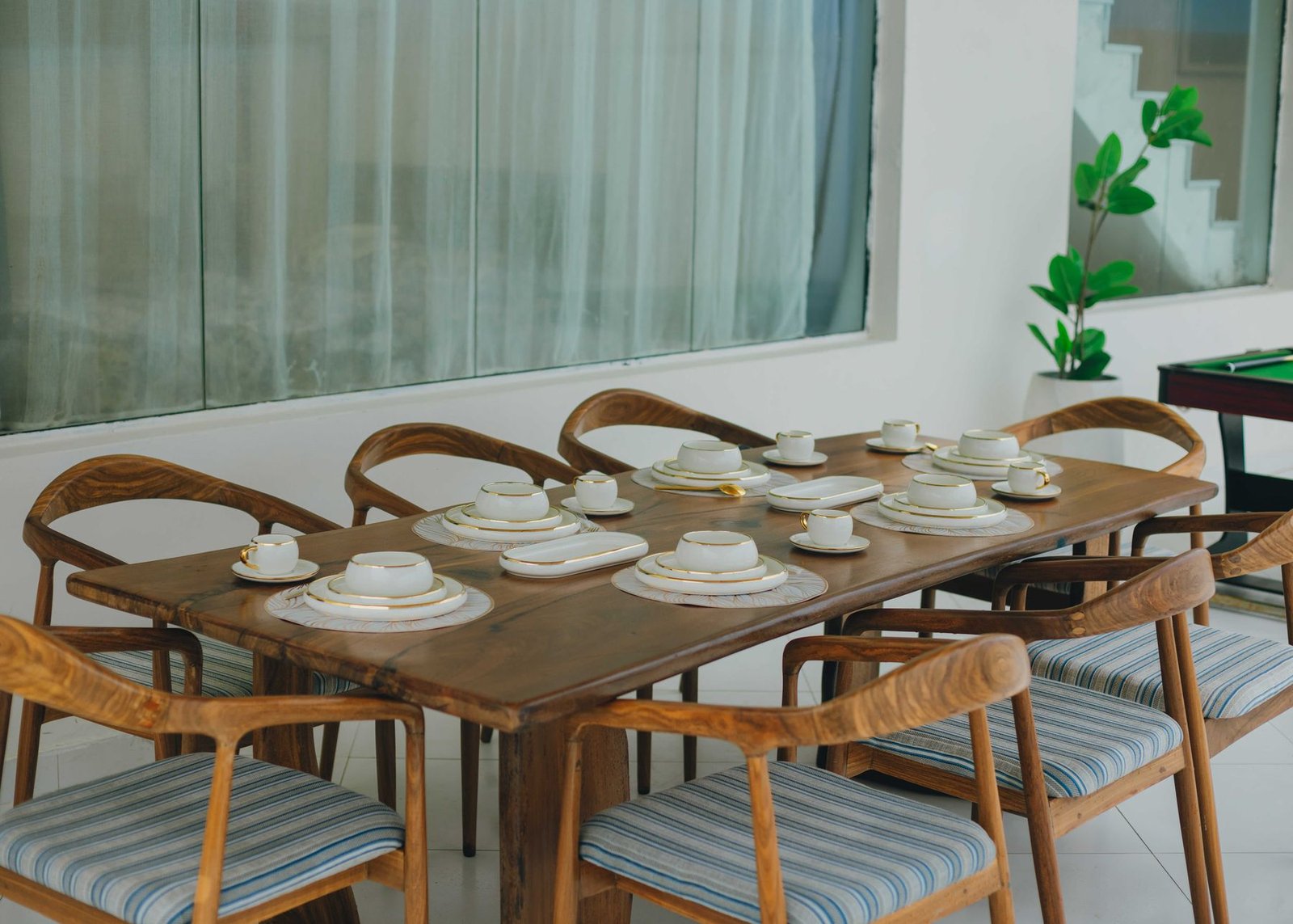 A long table laid for a group on the terrace