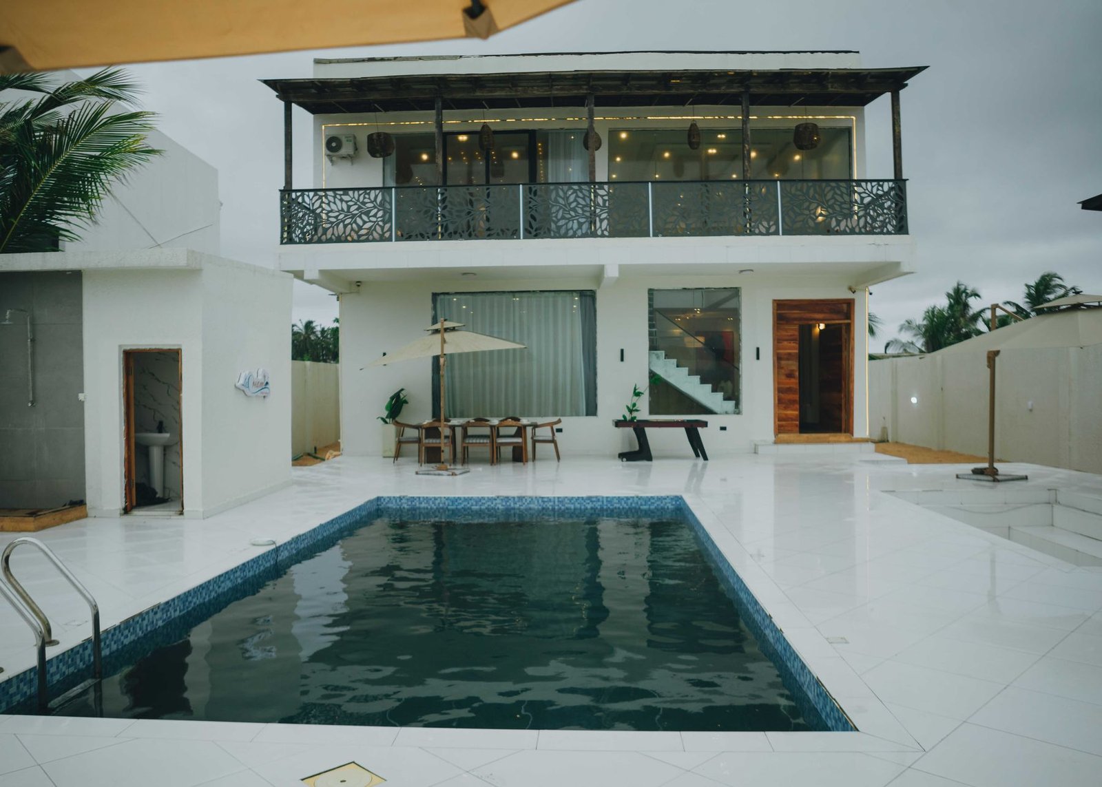 The pool and terrace with the villa behind